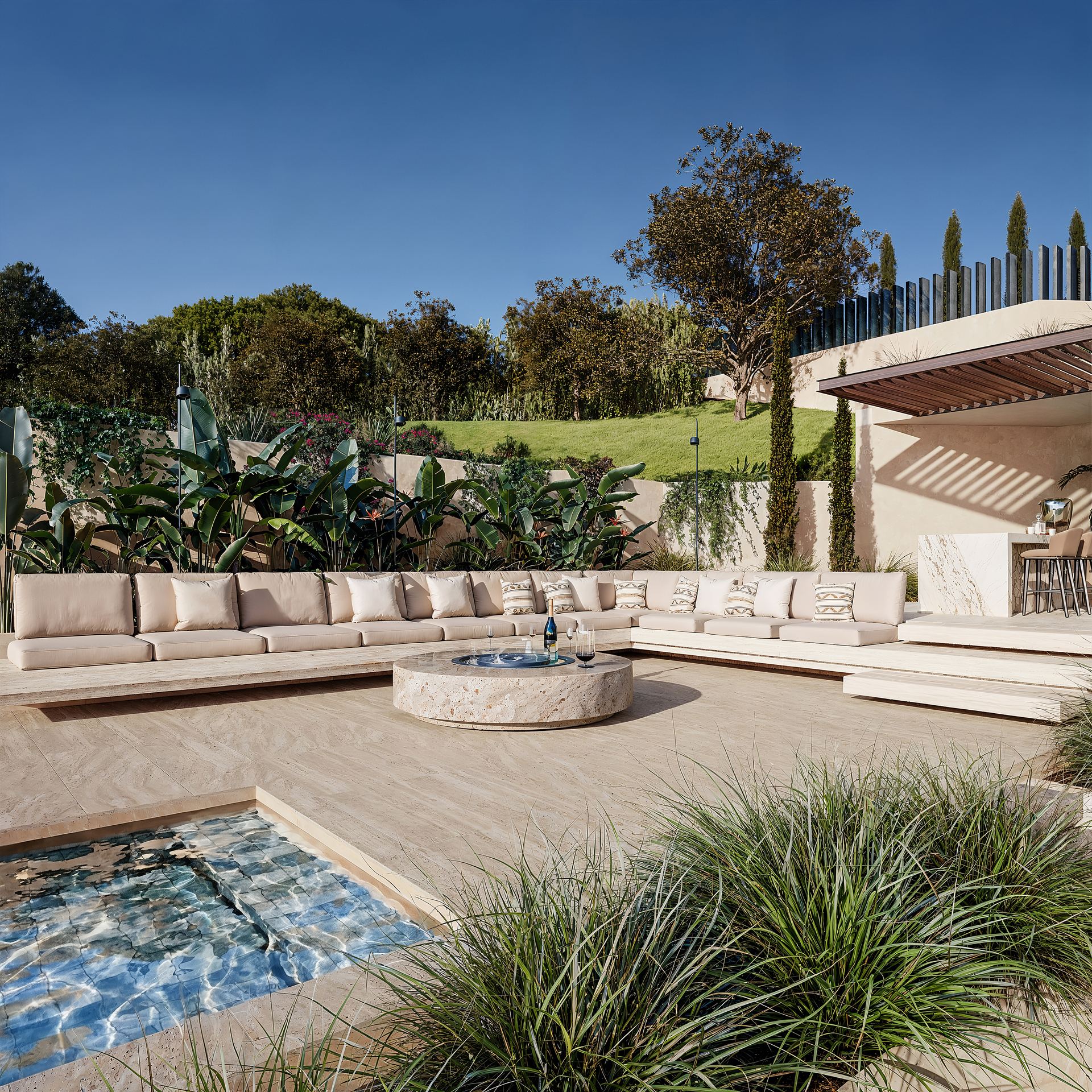 Luxury villa for sale France - pool and firepit lounge at sunset